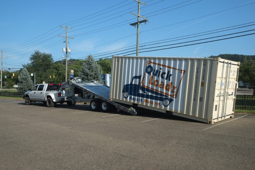 The QuickLoadz 24k Super 20 Loading a Container from the Ground